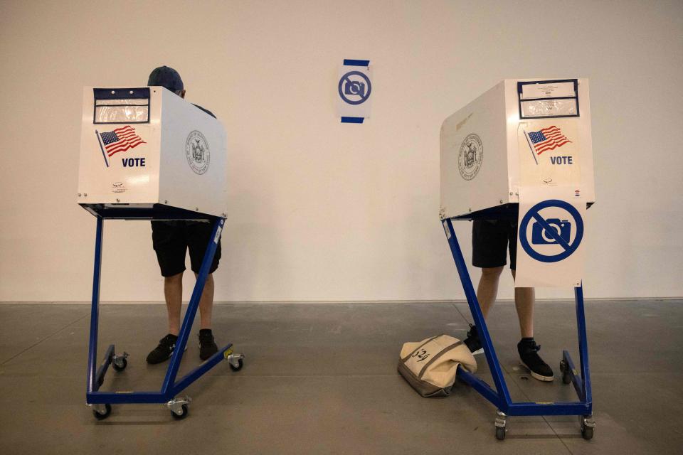 Voters cast their ballots during the primary election on August 23, 2022 in New York.