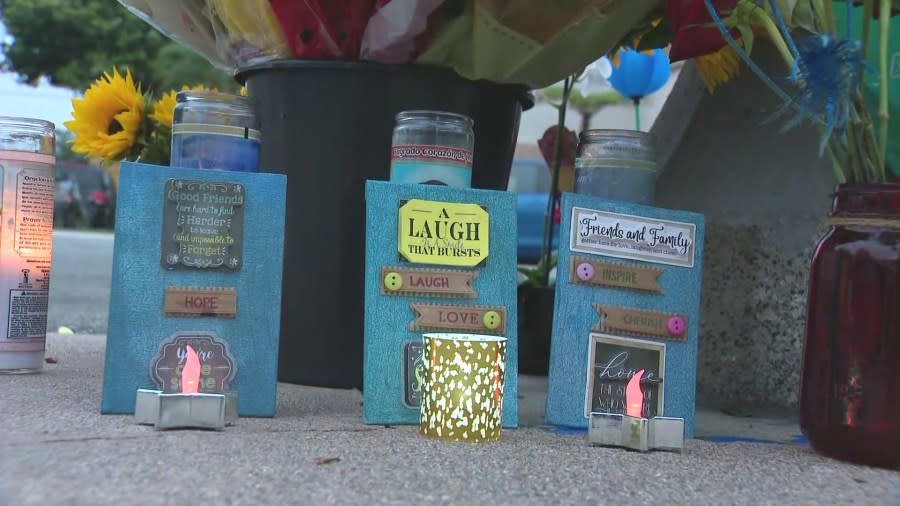 A makeshift memorial honoring the victims of a deadly mass stabbing during a fireworks celebration in Huntington Beach on July 4, 2024. (KTLA)