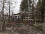 This April 26, 2022 photo provided by Ukrainian school administrator Valentina Grusha shows damage to the Cooks Comprehensive school complex in Kukhari, Ukraine. The village outside Kyiv was under Russian occupation in March and April, until Ukrainian forces drove them out. (Valentina Grusha via AP)