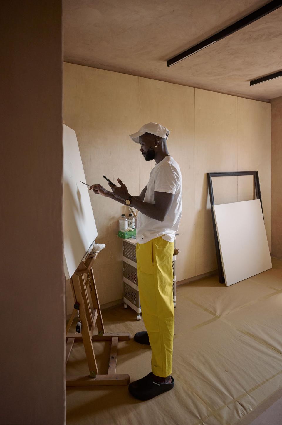 Artist Amoako Boafo at work in Accra, Ghana.