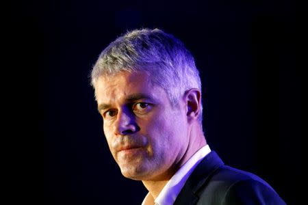 FILE PHOTO - Laurent Wauquiez, the front-runner for the leadership of French conservative party "Les Republicains" (The Republicans) attends a political rally in Paris, France November 20, 2017. REUTERS/Philippe Wojazer