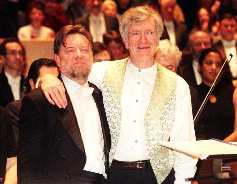 Composer Anthony Payne (right) and his conductor Sir Andrew Davis enjoy the audience’s applause after the first public performance of Elgar’s unfinished Third Symphony at the Royal Festival Hall in London, February 1998 (PA)