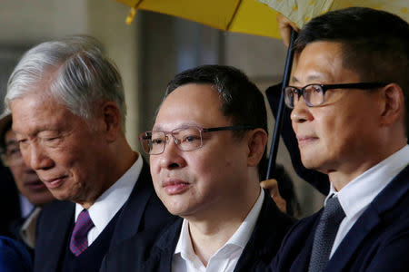 FILE PHOTO: Occupy Central pro-democracy movement founders Chu Yiu-ming, Benny Tai and Chan Kin-man meet journalists outside a court after a hearing in Hong Kong, China, November 19, 2018. REUTERS/Bobby Yip/File Photo