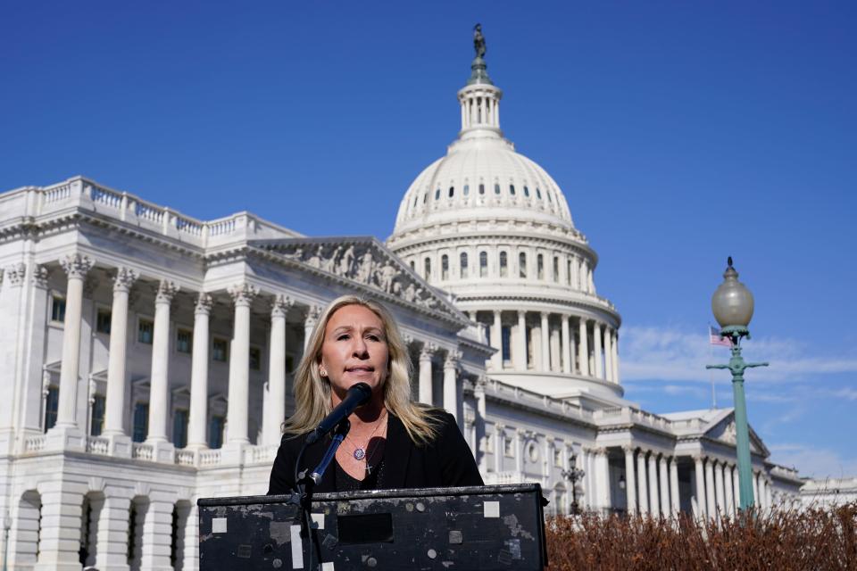 Rep. Marjorie Taylor Greene, R-Ga., speaks during a news conference on Capitol Hill in February.