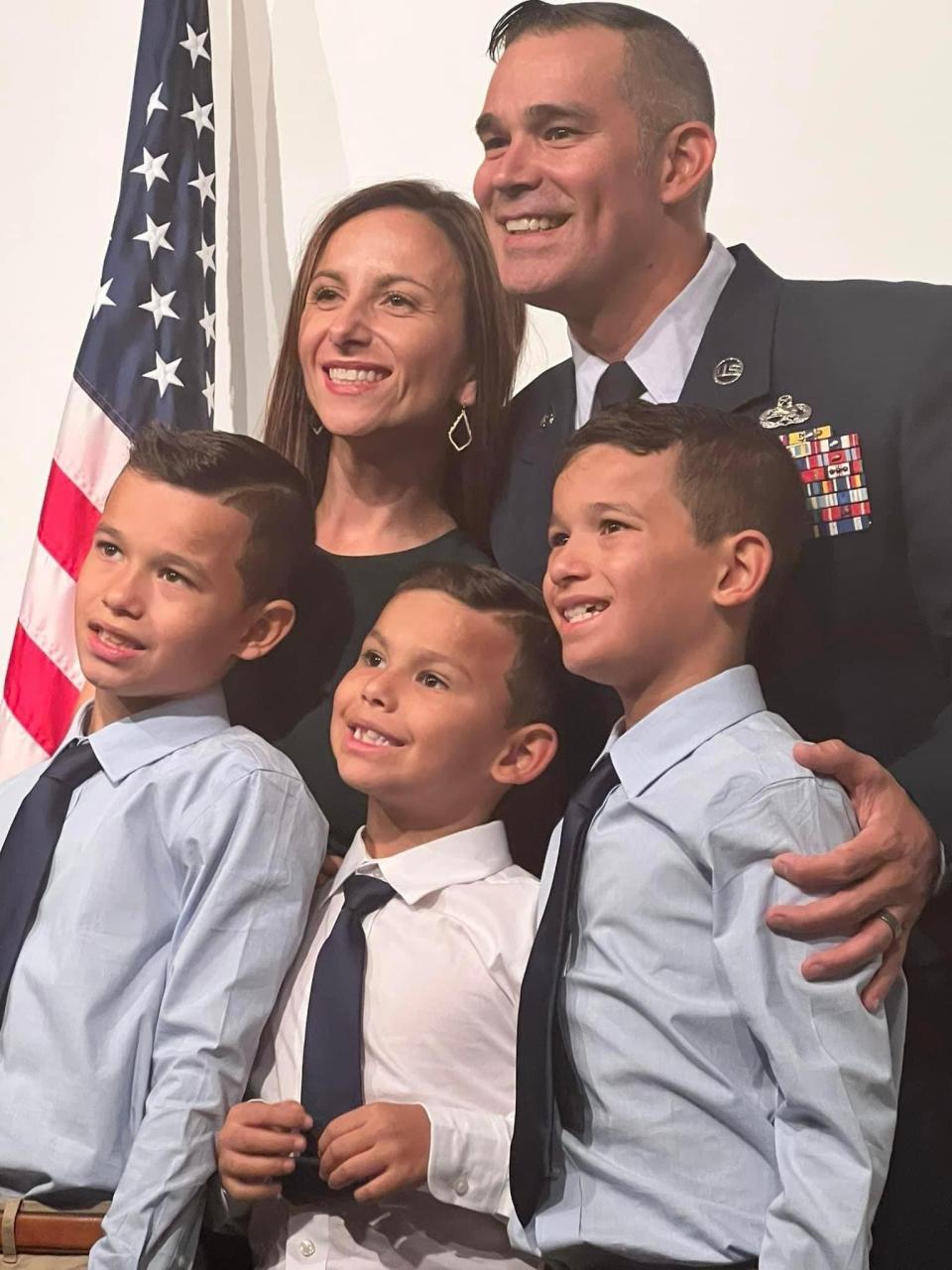 Angela and retired U.S. Air Force Master Sgt. John Nandin pose with their three boys Joey, Danny and Anthony.