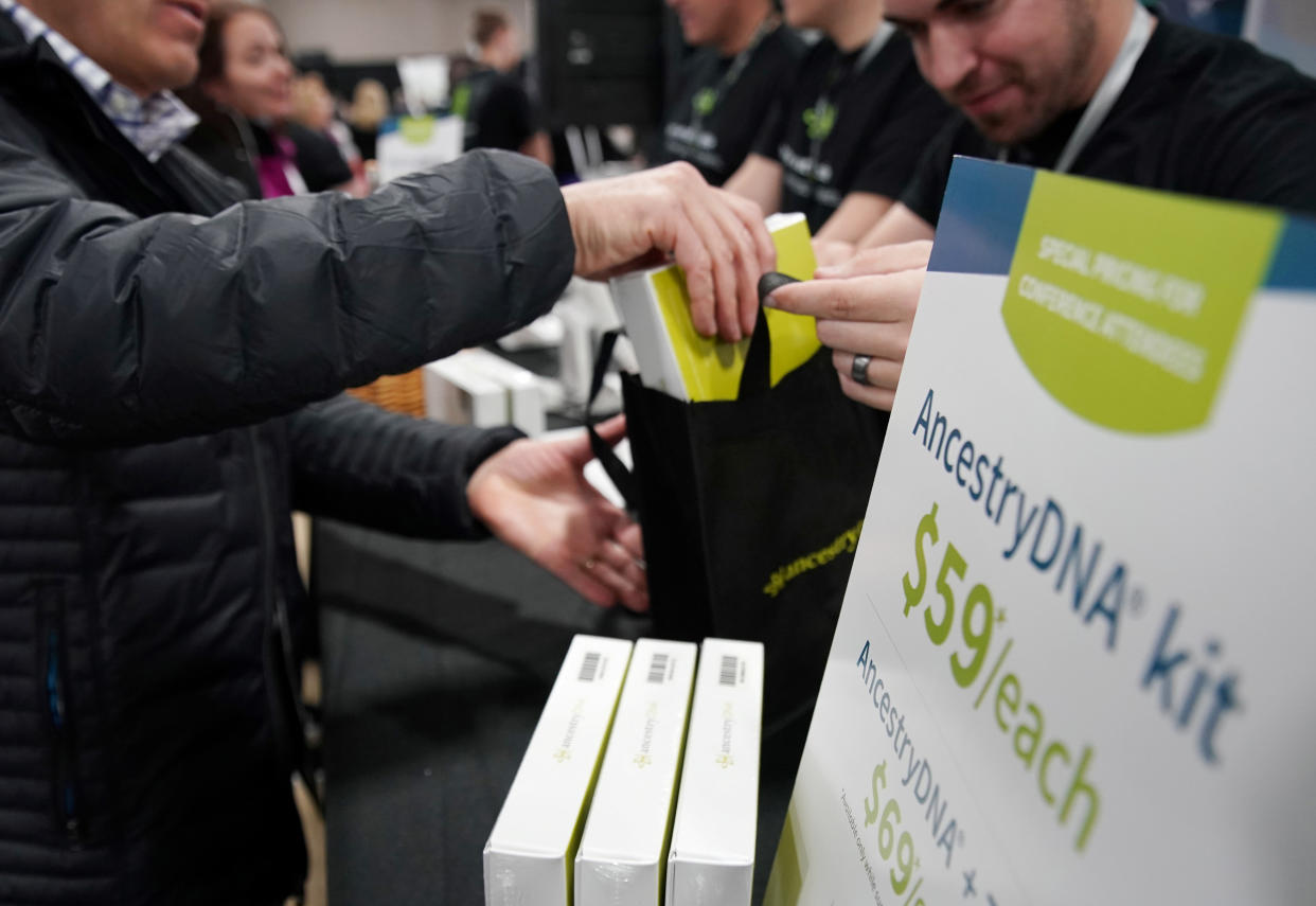Attendees buy Ancestry.com DNA kits at the 2019 RootsTech annual genealogical event in Salt Lake City, Utah, U.S., February 28, 2019.  REUTERS/George Frey