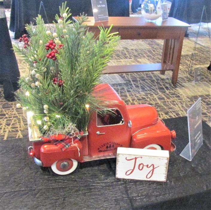 One of the many Christmas wreaths and centerpieces sold at last year's Pomerene Hospital Christmas Festival at the Berlin Grande Hotel. The 2022 event takes place this Friday and Saturday, Dec. 2-3.
(Photo: Kevin Lynch/Wooster Daily Record)