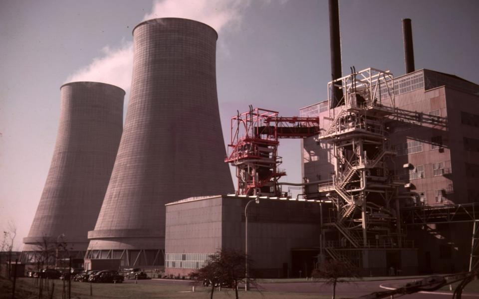 Cooling towers and a reactor at the world's first full-scale atomic power station at Calder Hall - Hulton Archive