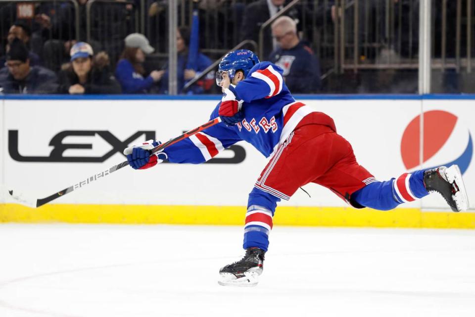 New York Rangers defenseman Tony DeAngelo (77) propels the puck down ice during the first period of an NHL hockey game against the New Jersey Devils, Thursday, Jan. 9, 2020, in New York. (AP Photo/Kathy Willens)