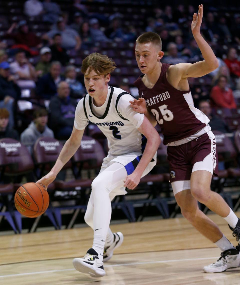 Greenwood's Collin Clark shields off a defender during the Blue Jays' game vs. Strafford during Blue and Gold tournament action at Great Southern Bank Arena in Springfield on December 27, 2022.