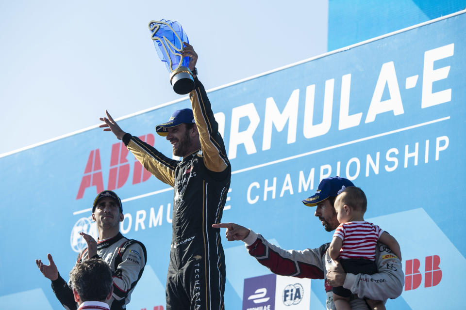 NEW YORK, NY - JULY 13: In this handout from FIA Formula E Championship winner Jean-Eric Vergne (FRA), DS TECHEETAH celebrates on the podium with Sébastien Buemi (CHE), Nissan e.Dams, 2nd position, and Lucas Di Grassi (BRA), Audi Sport ABT Schaeffler, 3rd position  during the New York E-Prix, Race 12 of the 2018/19 ABB FIA Formula E Championship at Brooklyn Street Circuit  {Photo by FIA ABB Formula-E Handout/Getty Images,)