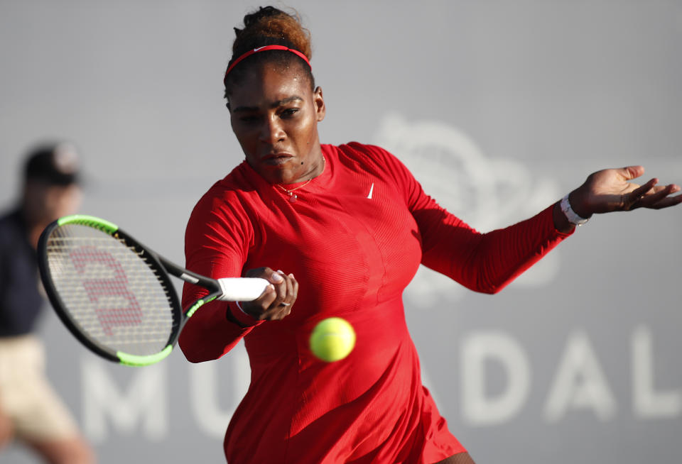 Serena Williams, of the United States, returns the ball to Johanna Konta, of Britain, during the first set of a match at the Mubadala Silicon Valley Classic tennis tournament in San Jose, Calif., Tuesday, July 31, 2018. Konta won 6-1, 6-0. (AP Photo/Tony Avelar)