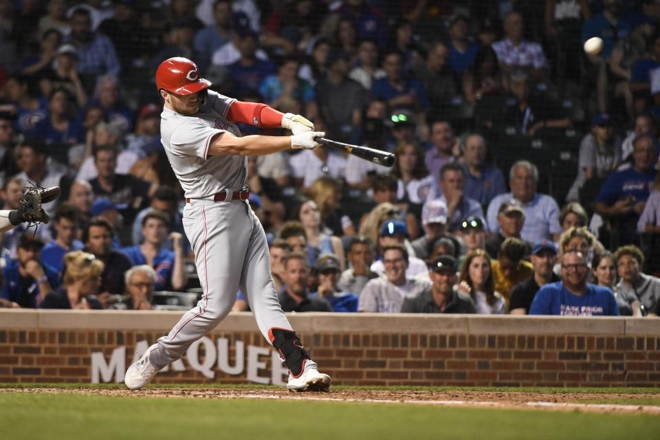 Cincinnati Reds' Brandon Drury hits an RBI double during the sixth inning of a baseball game against the Chicago Cubs in Chicago, Tuesday, June 28, 2022.