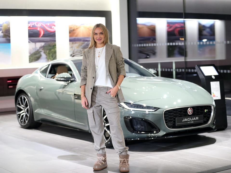 Nina Suess at the Jaguar F-Type in a special colour theme during the Jaguar Land Rover presentation Special Vehicle Operations ( "Das neue Luxus-Zeitalter) and panel discussion on November 30, 2021 at Jaguar Land Rover dealer shop in Munich, Germany.