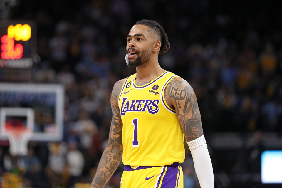 MEMPHIS, TENNESSEE - APRIL 26: D'Angelo Russell #1 of the Los Angeles Lakers looks on against the Memphis Grizzlies during Game Five of the Western Conference First Round Playoffs at FedExForum on April 26, 2023 in Memphis, Tennessee. NOTE TO USER: User expressly acknowledges and agrees that, by downloading and or using this photograph, User is consenting to the terms and conditions of the Getty Images License Agreement. (Photo by Justin Ford/Getty Images)