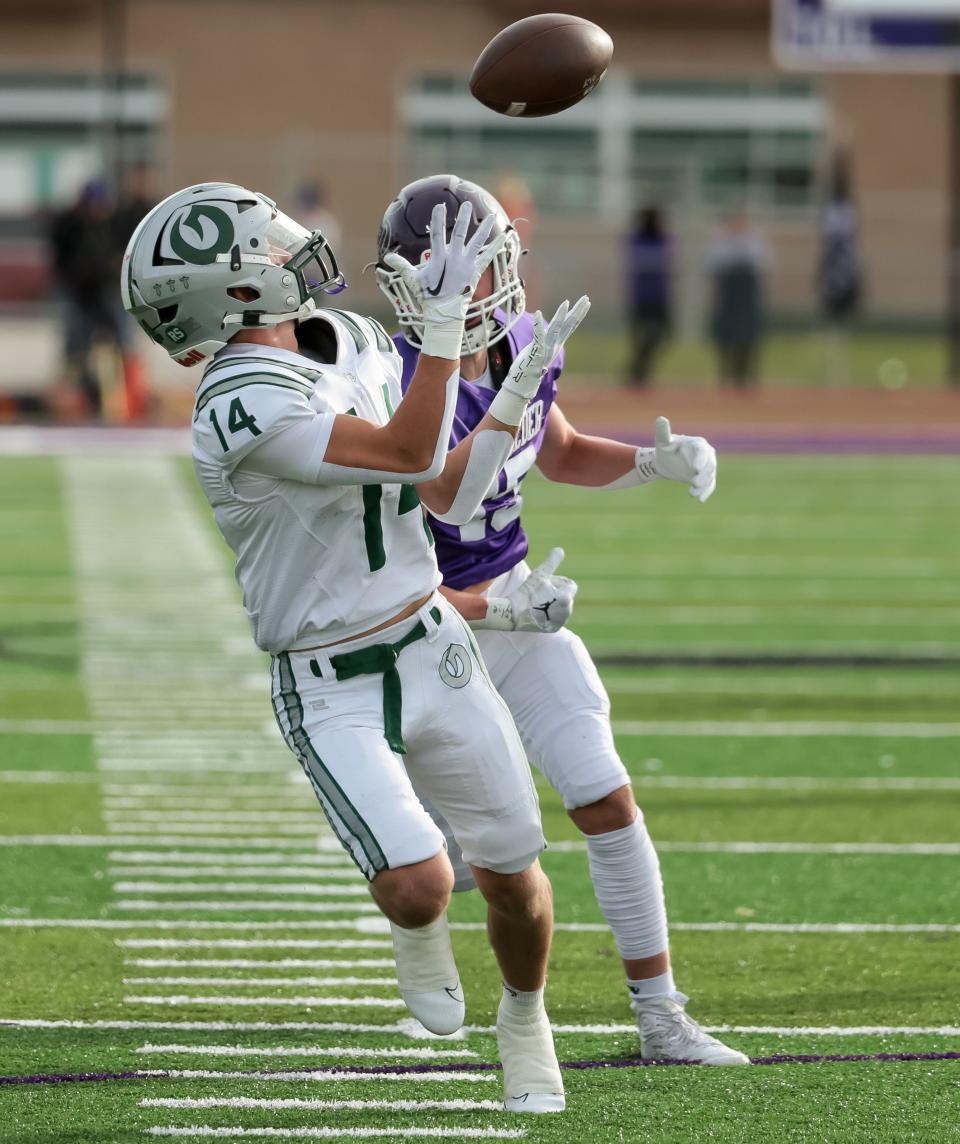 Olympus’ Caden Lloyd makes a catch and runs the ball for a touchdown in a 5A quarterfinal high school football game against Box Elder in Brigham City on Friday, Nov. 3, 2023. | Spenser Heaps, Deseret News