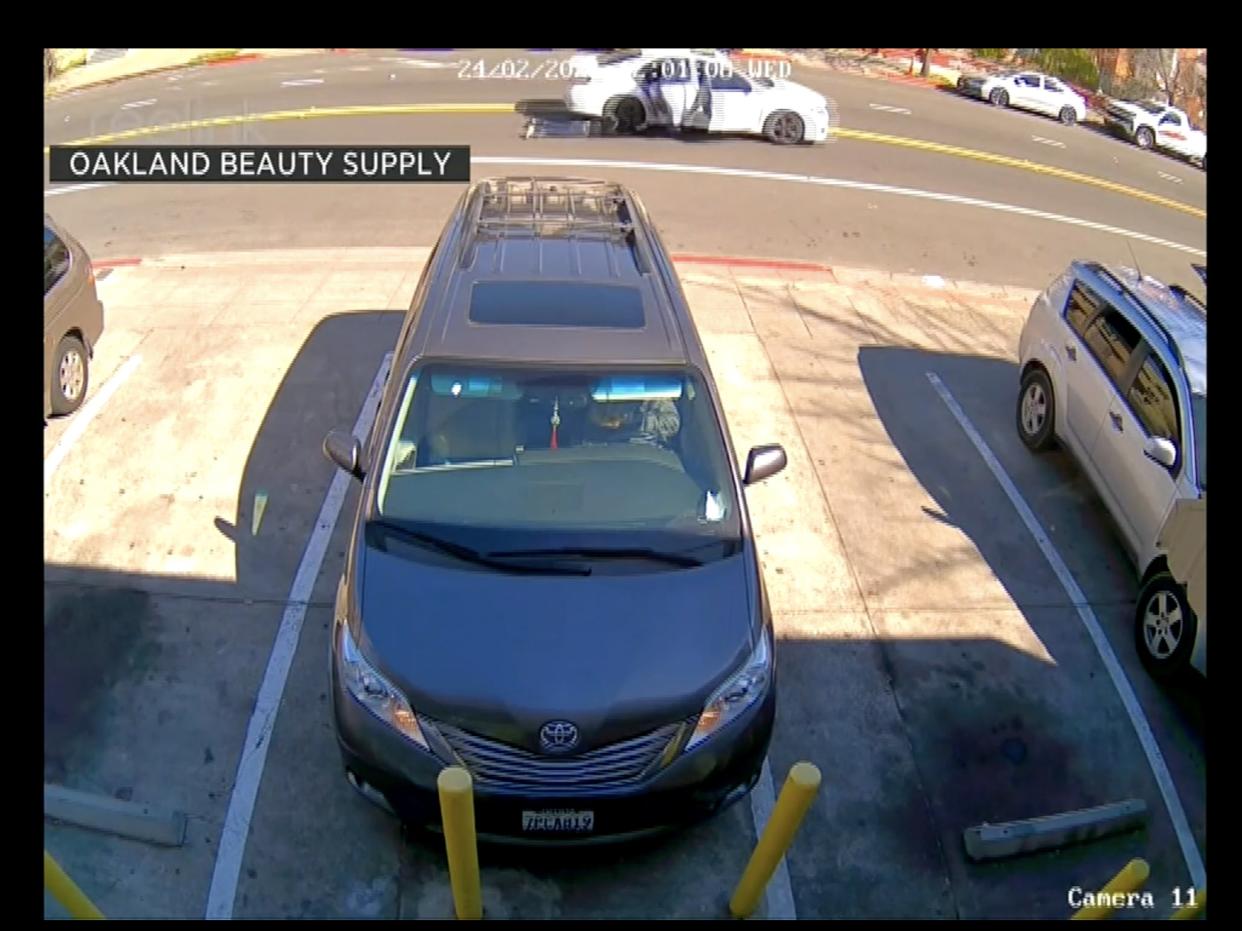 <p>A woman is dragged by a car as her bag is snatched</p> (Oakland Beauty Supply)