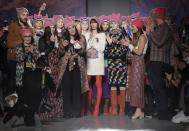 Fashion designer Angela Missoni talks at the end of the presentation of th Missoni women's Fall-Winter 2017-2018 collection, part of the Milan Fashion Week, unveiled in Milan, Italy, Saturday, Feb. 25, 2017. (AP Photo/Luca bruno)