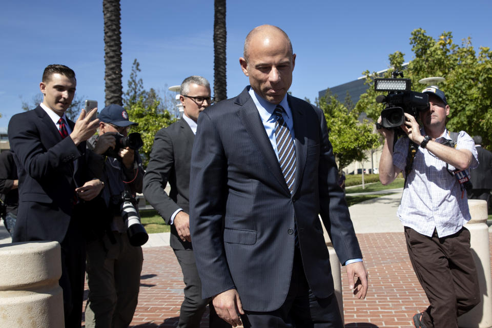 Attorney Michael Avenatti leaves federal court after a hearing, Monday, April 1, 2019, in Santa Ana, Calif. Avenatti appeared in federal court on charges he fraudulently obtained $4 million in bank loans and pocketed $1.6 million that belonged to a client. (AP Photo/Jae C. Hong)