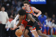 Oklahoma City Thunder center Mike Muscala, back, tries to steal the ball from Houston Rockets guard Jalen Green during the first half of an NBA basketball game Wednesday, March 27, 2024, in Oklahoma City. (AP Photo/Nate Billings)