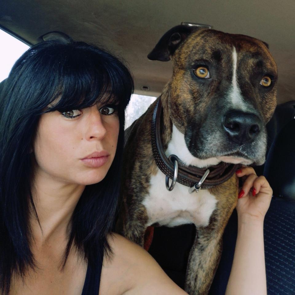 Elisa Pilarski, 29, with one of her pet dogs. 