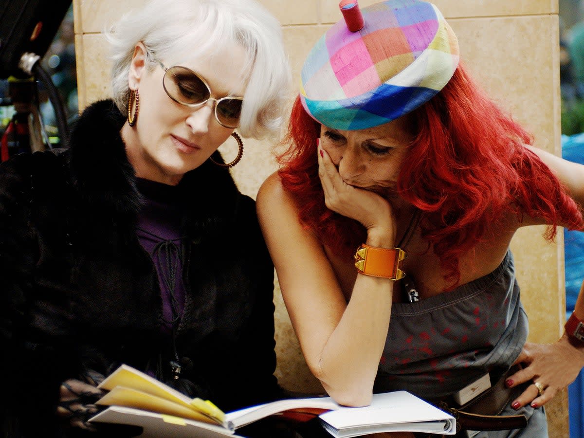 Costume designer Patricia Field (right) and Meryl Streep on the set of 2006’s ‘The Devil Wears Prada’  (Shutterstock)