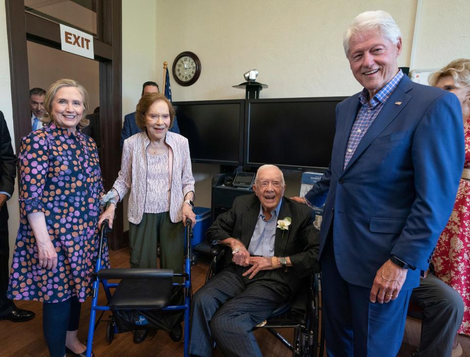 Former President Jimmy Carter and his wife Rosalynn meet with former President Bill Clinton and his wife Hillary Rodham Clinton as they celebrate their 75th wedding anniversary Saturday, July 10, 2021, in Plains, Ga.