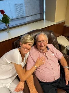 Jan Jensen, associate head coach of the Iowa women's basketball team, is shown with her father, Dale, at a healthier time. Dale passed away during Iowa's run to the national title game.