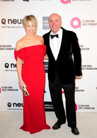 FILE PHOTO: Kevin O'Leary and his wife Linda arrive at the 2014 Elton John AIDS Foundation Oscar Party in West Hollywood