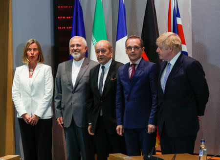 Britain's Foreign Secretary Boris Johnson, German Foreign Minister Heiko Maas, French Foreign Minister Jean-Yves Le Drian and EU High Representative for Foreign Affairs Federica Mogherini take part in meeting with Iran's Foreign Minister Mohammad Javad Zarif in Brussels, Belgium, May 15, 2018. REUTERS/Yves Herman/Pool