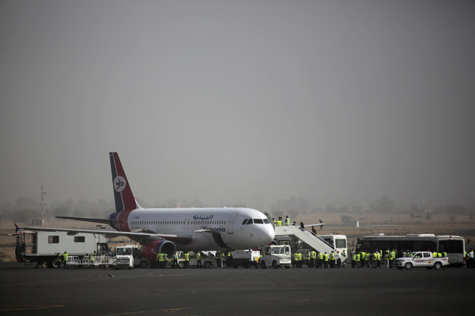 A Yemen Airways plane is prepared for departure as the first commercial flight at Sanaa airport, Yemen, Monday, May, 16, 2022. The first commercial flight in six years took off from Yemen’s rebel-held capital on Monday, officials said, part of a fragile truce in the county’s grinding civil war. (AP Photo/Hani Mohammed)