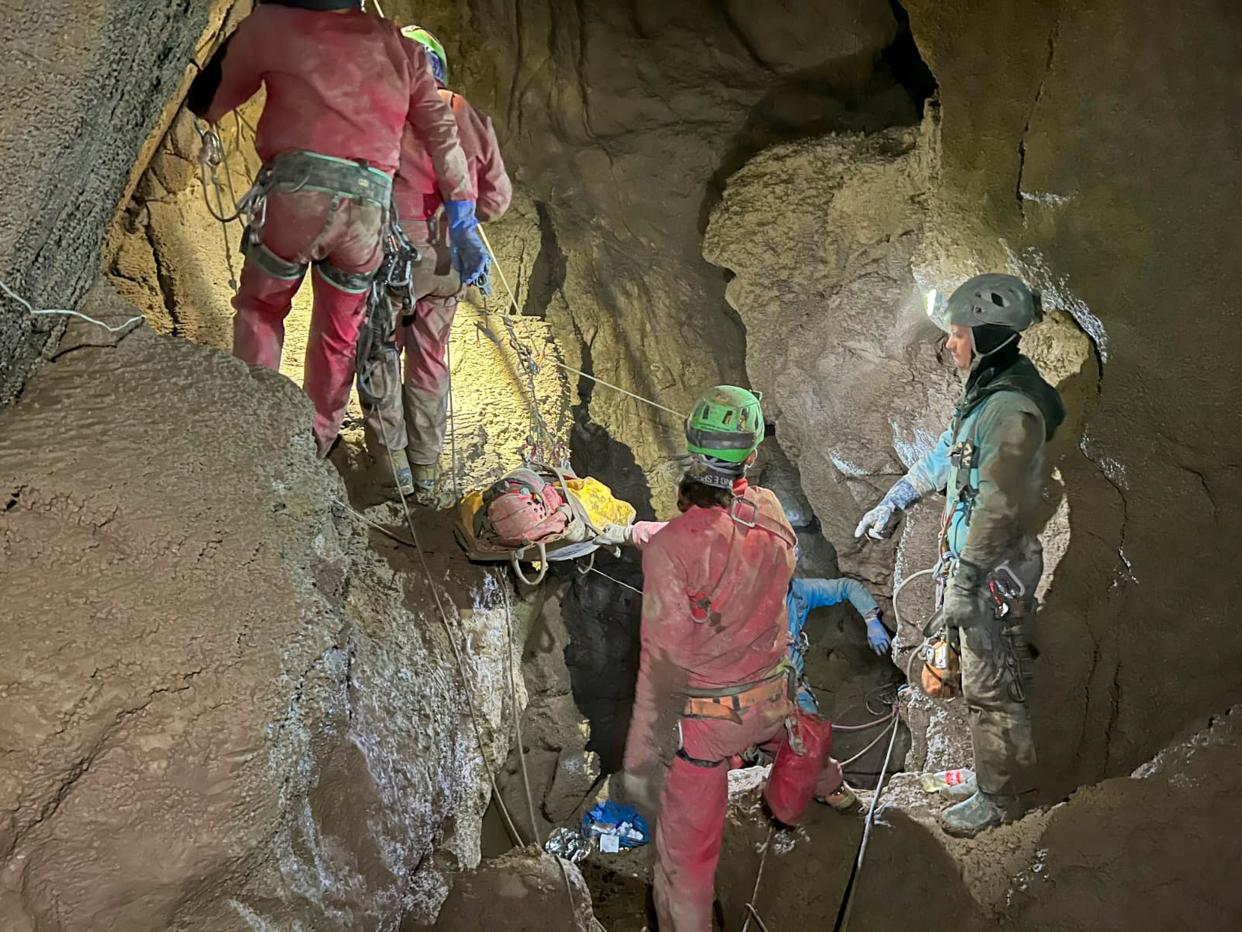 Members of the CNSAS, Italian alpine and speleological rescuers, carry a stretcher with American researcher Mark Dickey during a rescue operation in the Morca cave, near Anamur, southern Turkey, Monday, Sept. 11, 2023. (AP)