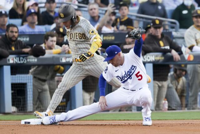 Freddie Freeman of the Los Angeles Dodgers runs to the dugout