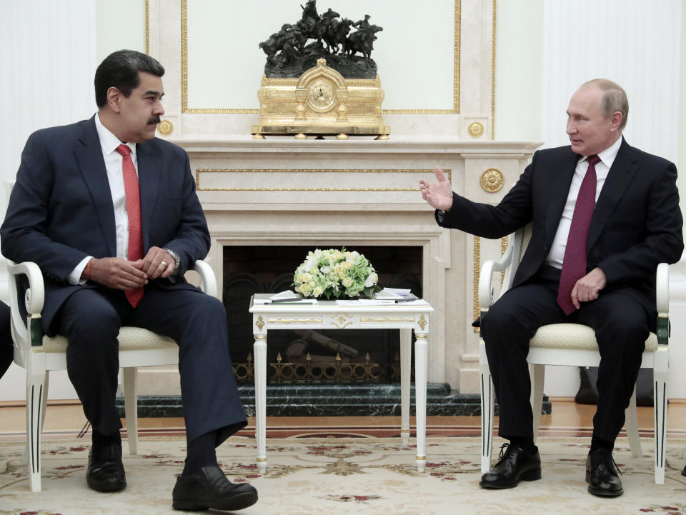 Russian President Vladimir Putin, right, speaks with Venezuela's President Nicolas Maduro during their meeting in the Kremlin in Moscow, Russia, Wednesday Sept. 25, 2019. Nicolas Maduro is on a working visit to Moscow. (Sergei Chirikov/Pool Photo via AP)