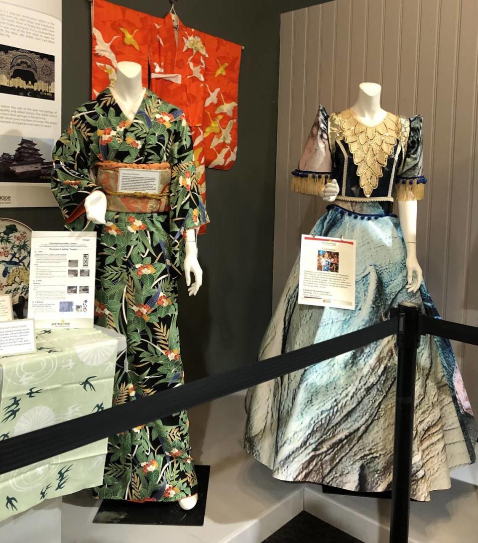 A dress designed by Edelweiss Vogel out of upcycled billboard was on display from May to July at the Charlotte Museum of History for the AAPI Exhibit “The Journey of Hope.” Courtesy of Edelweiss Vogel, Asian Chamber and Asian American Foundation of the Carolinas.