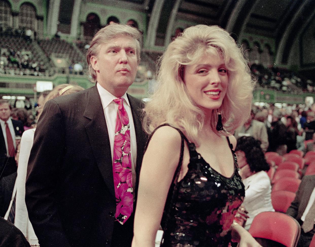 Donald Trump and his girlfriend Marla Maples are seen at the Holyfield-Foreman fight at Trump Plaza in Atlantic City, N.J., on April 19, 1991.