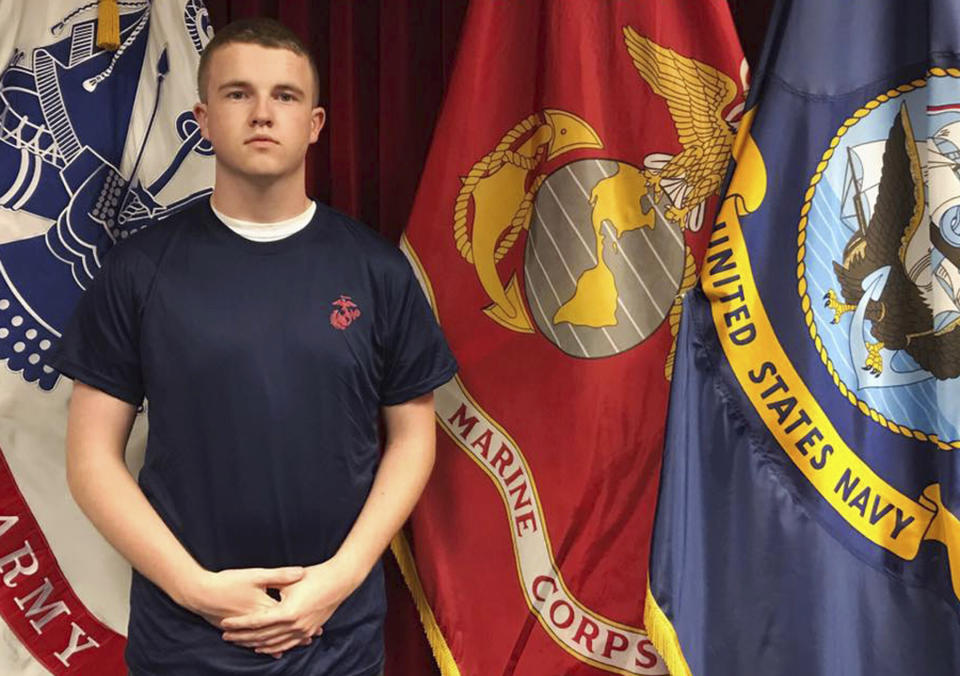 FILE- In this undated file photo provided by the U.S. Marine Corps, Tyler Jarrell, 18, poses for a photo. Jarrell was killed in a thrill ride accident at the Ohio State Fair on July 26, 2017, in Columbus, Ohio. Ohio has beefed up its amusement ride inspections four years after the ride broke apart at the 2017 Ohio State Fair and killed Jarrell and injured several others. But some ride operators and festival organizers say the state's inspectors are overreaching and shutting down rides over issues that aren't safety-related. (U.S. Marine Corps via AP)