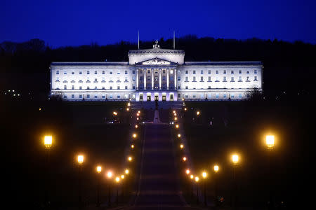 FILE PHOTO: Parliament buildings at Stormont is seen at night in Belfast, Northern Ireland February 15, 2018. REUTERS/Clodagh Kilcoyne/File Photo