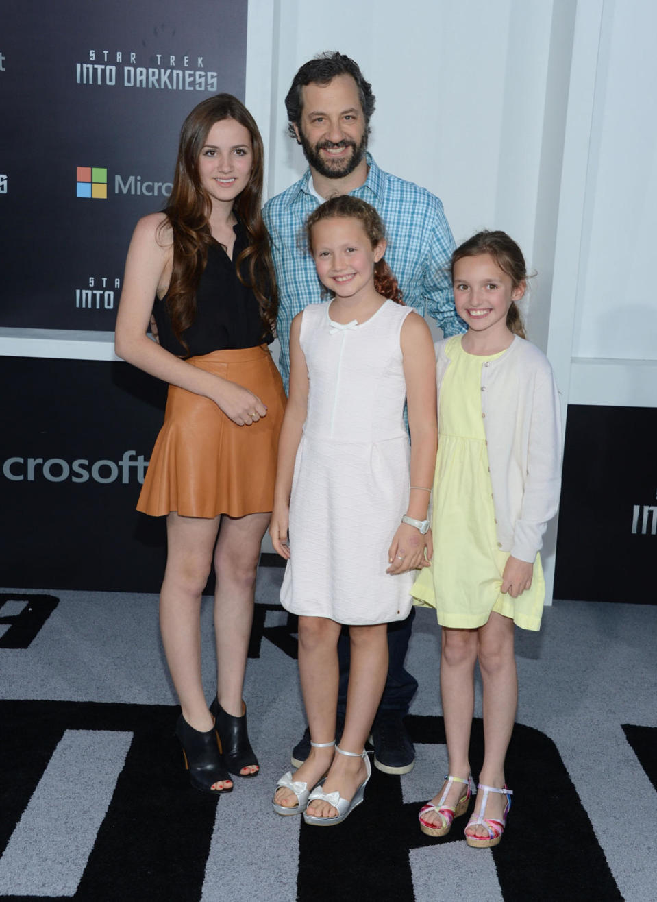 <p>Looking stylish in a leather mini skirt while attending the “Star Trek Into Darkness” premiere with her dad and sister (and one super excited friend). <i>(Photo by Jason Kempin/Getty Images)</i></p>