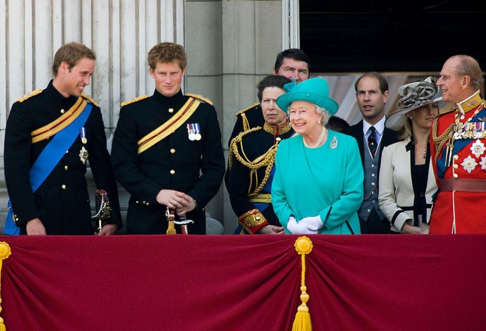 <p>Princes William and Harry, along with Queen Elizabeth, are all smiles on the balcony.</p>