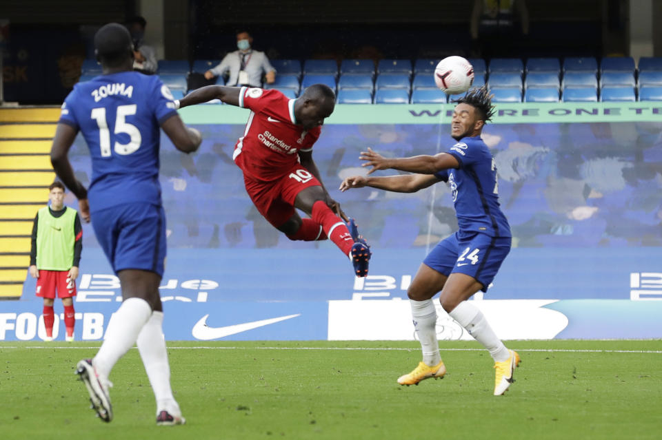 Soccer Football - Premier League - Chelsea v Liverpool - Stamford Bridge, London, Britain - September 20, 2020 Liverpool's Sadio Mane scores their first goal Pool via REUTERS/Matt Dunham EDITORIAL USE ONLY. No use with unauthorized audio, video, data, fixture lists, club/league logos or 'live' services. Online in-match use limited to 75 images, no video emulation. No use in betting, games or single club/league/player publications.  Please contact your account representative for further details.