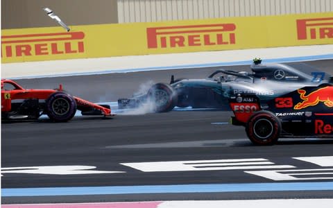 Valtteri Bottas spins after being hit by Sebastian Vettel - Credit: ap