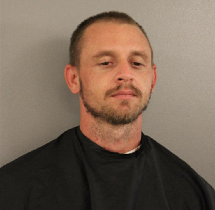 Michael Stark, 33, who is accused of shooting a Bastrop County deputy, was arrested Monday.