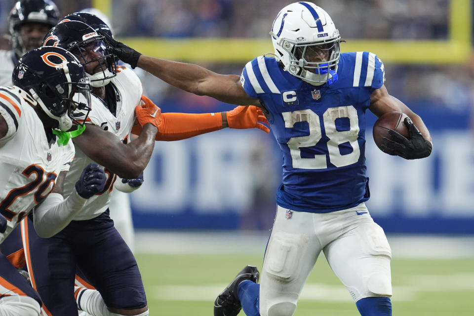 Indianapolis Colts running back Jonathan Taylor (28) runs against the Chicago Bears during the second half of an NFL football game Sunday, Sept. 22, 2024, in Indianapolis. (AP Photo/Michael Conroy)