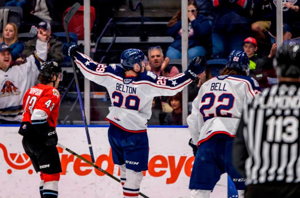 Tri-City Americans Reese Belton (29) and Parker Bell (22) join an on ice celebration during 2022-23 season.