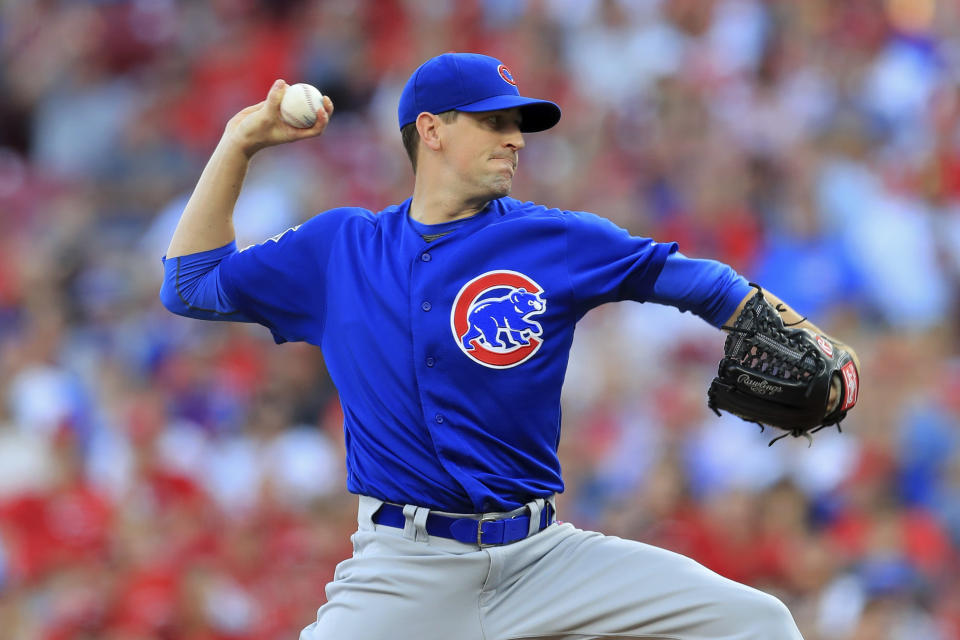 Chicago Cubs' Kyle Hendricks throws in the first inning inning of a baseball game against the Cincinnati Reds, Saturday, Aug. 10, 2019, in Cincinnati. (AP Photo/Aaron Doster)