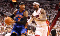 MIAMI, FL - MAY 09: Forward LeBron James #6 of the Miami Heat defends Forward Carmelo Anthony#7 of the New York Knicks in Game Five of the Eastern Conference Quarterfinals in the 2012 NBA Playoffs on May 9, 2012 at the American Airines Arena in Miami, Florida. NOTE TO USER: User expressly acknowledges and agrees that, by downloading and or using this photograph, User is consenting to the terms and conditions of the Getty Images License Agreement. (Photo by Marc Serota/Getty Images)