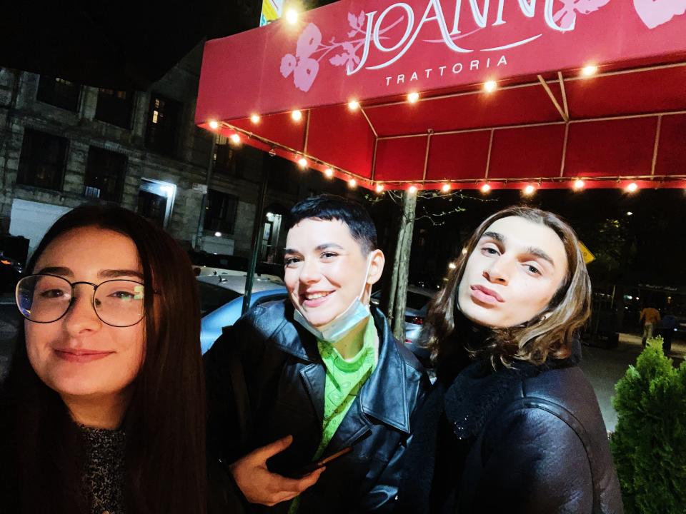 author and two friends outside joanne trattoria