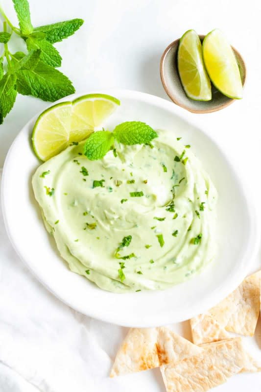 <p>It's Not Complicated</p><p>It is light, silky smooth and refreshing with an extra flavor boost from mint.</p><p><strong>Get the recipe: <a href="https://itsnotcomplicatedrecipes.com/avocado-yoghurt-and-mint-dip/" rel="nofollow noopener" target="_blank" data-ylk="slk:Avocado Yogurt Mint Dip;elm:context_link;itc:0;sec:content-canvas" class="link rapid-noclick-resp">Avocado Yogurt Mint Dip </a></strong></p>
