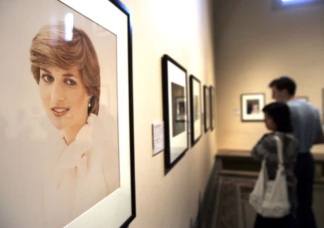<p>AP Photo/Lefteris Pitarakis</p> Image of Princess Diana on display at the 'Diana, Princess of Wales' exhibition in 2007